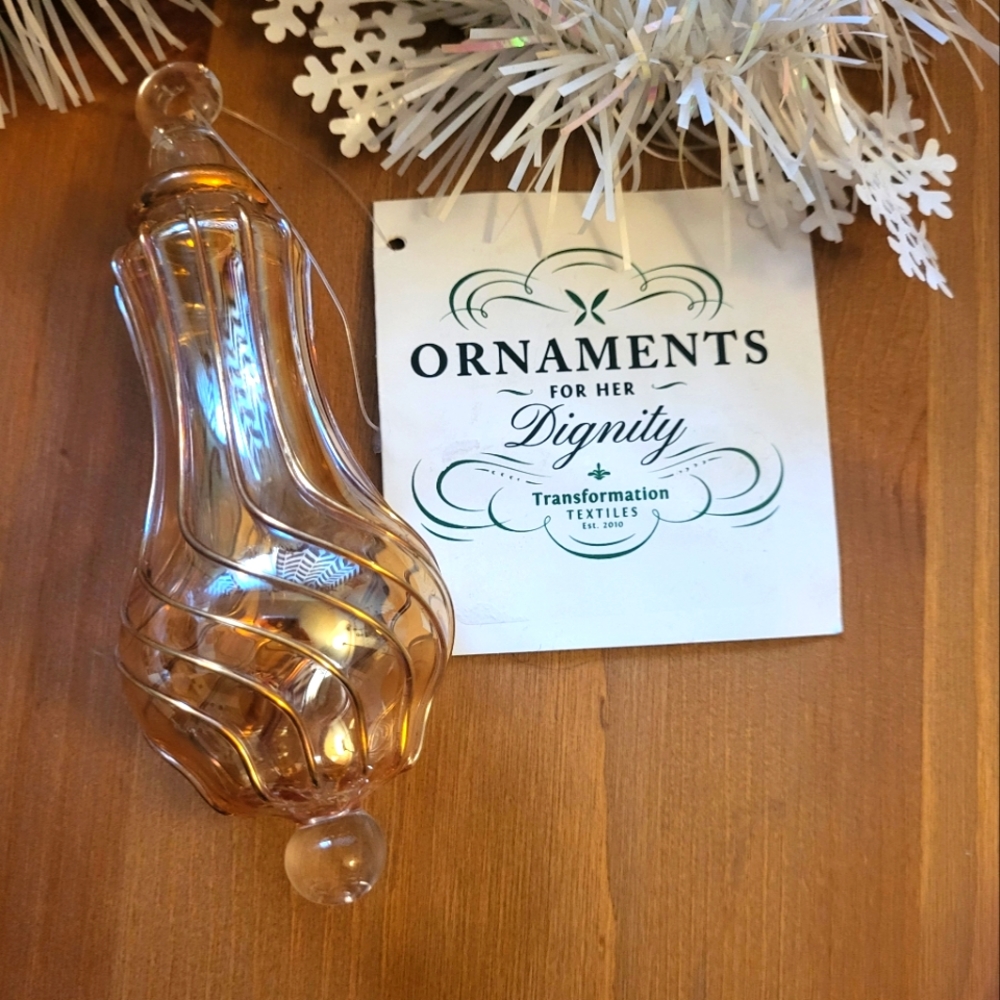 Transformation textiles glass ornament